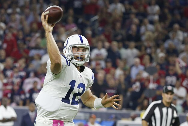 HOUSTON, TX- OCTOBER 09:  Andrew Luck #12 of the Indianapolis Colts passes against the Houston Texans in the first quarter in a NFL game on October 9, 2014 at NRG Stadium in Houston, Texas. (Photo by Scott Halleran/Getty Images)