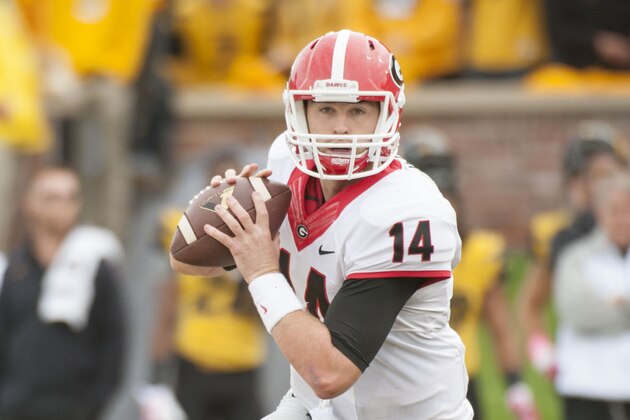 Georgia quarterback Hutson Mason throws a pass during the first quarter of an NCAA college football game against Missouri Saturday, Oct. 11, 2014, in Columbia, Mo. (AP Photo/L.G. Patterson)