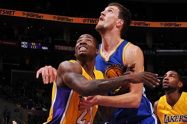 LOS ANGELES, CA - OCTOBER 9: Ed Davis #21 of the Los Angeles Lakers boxes out Ognjen Kuzmic #1 of the Golden State Warriors on October 9, 2014 at the Staples Center in Los Angeles, California. NOTE TO USER:  User expressly acknowledges and agrees that, by downloading and or using this Photograph, user is consenting to the terms and conditions of the Getty Images License Agreement.  Mandatory Copyright Notice:  Copyright 2014 NBAE (Photo by Juan Ocampo/NBAE via Getty Images)