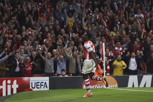 Arsenal's Danny Welbeck  celebrates after scoring against Galatasaray during the Champions League Group D soccer match between Arsenal  and Galatasaray , at the Emirates Stadium in London, on Wednesday, Oct 1, 2014. (AP Photo/ Tim Ireland)