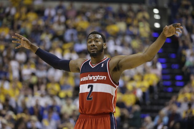 Washington Wizards' John Wall (2) in action during the second half of game 2 of the Eastern Conference semifinal NBA basketball playoff series against the Indiana Pacers Wednesday, May 7, 2014, in Indianapolis. Indiana defeated Washington 86-82. (AP Photo/Darron Cummings)