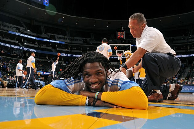DENVER, CO - October 8: Kenneth Faried #35 of the Denver Nuggets stretches before a game against the Oklahoma City Thunder on October 8, 2014 at the Pepsi Center in Denver, Colorado. NOTE TO USER: User expressly acknowledges and agrees that, by downloading and/or using this Photograph, user is consenting to the terms and conditions of the Getty Images License Agreement. Mandatory Copyright Notice: Copyright 2014 NBAE (Photo by Bart Young/NBAE via Getty Images)
