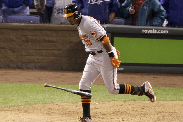 Baltimore Orioles' Adam Jones (10) reacts after popping out during the ninth inning of Game 3 of the American League baseball championship series against the Kansas City Royals Tuesday, Oct. 14, 2014, in Kansas City, Mo. (AP Photo/Michael Conroy)