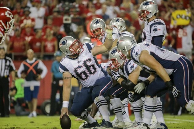 New England Patriots center Bryan Stork (66) prepares to snap the ball during the third quarter of an NFL football game against the Kansas City Chiefs Monday, Sept. 29, 2014, in Kansas City, Mo. (AP Photo/Charlie Riedel)