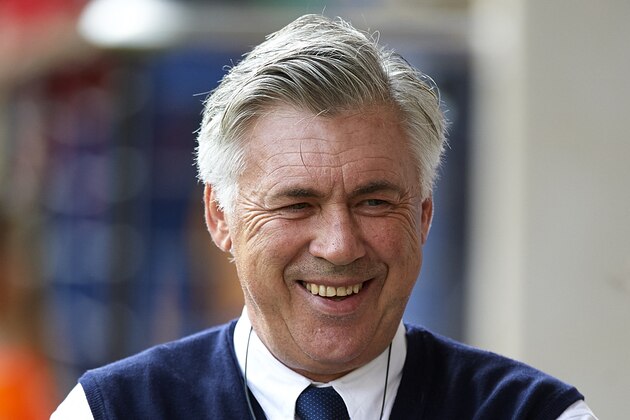 VILLARREAL, SPAIN - SEPTEMBER 27:  Real Madrid manager Carlo Ancelotti smiles prior to the La Liga match between Villarreal CF and Real Madrid at El Madrigal on September 27, 2014 in Villarreal, Spain.  (Photo by Manuel Queimadelos Alonso/Getty Images)