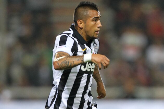 REGGIO NELL'EMILIA, ITALY - AUGUST 23:   Arturo Vidal of FC Juventus in action during the TIM Pre-season Tournament between US Sassuolo, FC Juventus and AC Milan at Mapei Stadium - Citta' del Tricolore on August 23, 2014 in Reggio nell'Emilia, Italy.  (Photo by Paolo Bruno/Getty Images)