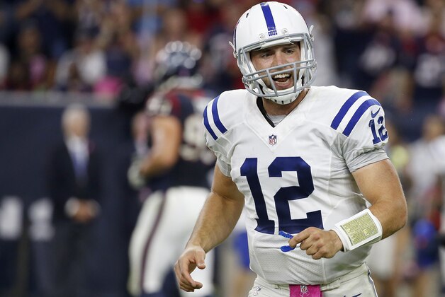 HOUSTON, TX- OCTOBER 09: Andrew Luck #12 of the Indianapolis Colts celebrates against the Houston Texans in the fourth quarter in a NFL game on October 9, 2014 at NRG Stadium in Houston, Texas. (Photo by Scott Halleran/Getty Images)