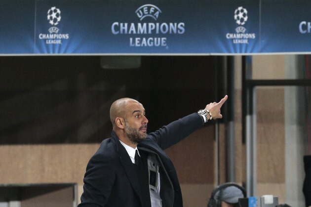 Bayern's head coach Pep Guardiola shouts orders during the Champions League Group E soccer match between CSKA Moscow and Bayern Munich at the Arena Khimki stadium in Moscow, Russia, Tuesday Sept. 30, 2014. (AP Photo/Ivan Sekretarev)