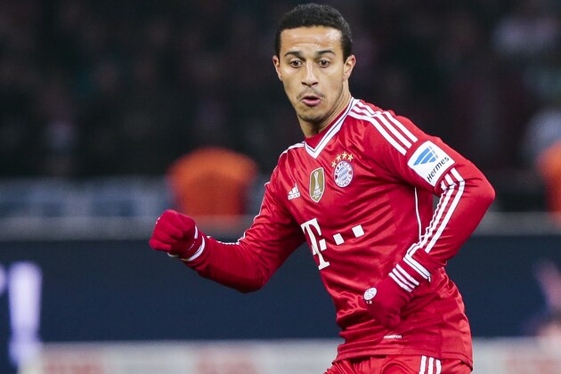 Bayern's Thiago Alcantara of Spain plays the ball during the first division Bundesliga soccer match between Hertha BSC and FC Bayern Munich in Berlin, Tuesday, March 25, 2014. (AP Photo/Markus Schreiber)