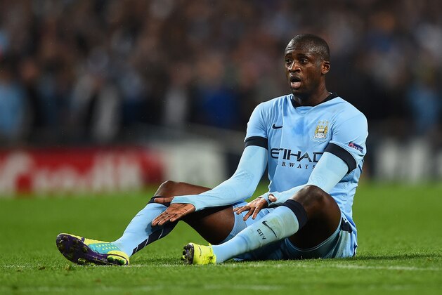 MANCHESTER, ENGLAND - SEPTEMBER 30:  Yaya Toure of Manchester City reacts during the UEFA Champions League Group E match between Manchester City FC and AS Roma on September 30, 2014 in Manchester, United Kingdom.  (Photo by Laurence Griffiths/Getty Images)