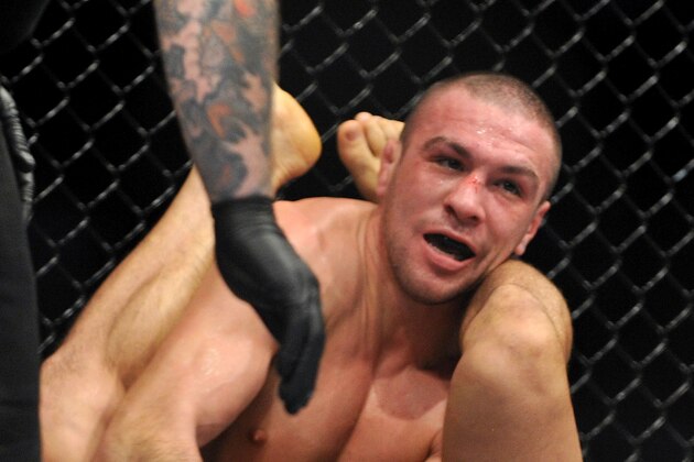 LOS ANGELES, CA - OCTOBER 24:  UFC fighter Gleison Tibau (top) battles with UFC fighter Josh Neer (top) during their Lightweight 'Swing' bout at UFC 104: Machida vs. Shogun at Staples Center on October 24, 2009 in Los Angeles, California.  (Photo by Jon Kopaloff/Getty Images)