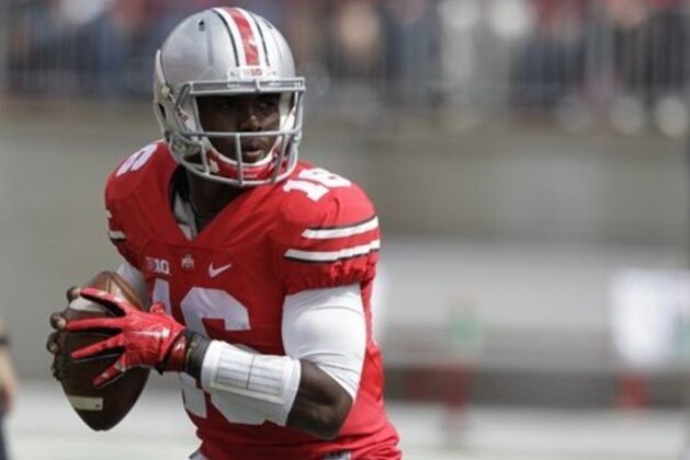 Ohio State quarterback J.T. Barrett plays against Kent State during an NCAA college football game Saturday, Sept. 13, 2014, in Columbus, Ohio. (AP Photo/Jay LaPrete)