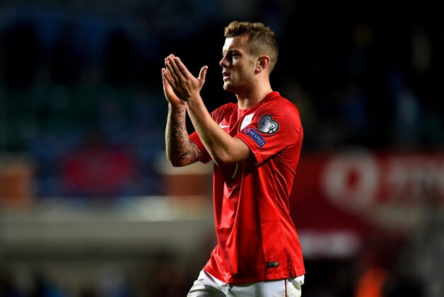 TALLINN, ESTONIA - OCTOBER 12:  Jack Wilshere of England applauds the travelling fans following his team's 1-0 victory during the EURO 2016 Qualifier match between Estonia and England at A. Le Coq Arena on October 12, 2014 in Tallinn, Estonia.  (Photo by Shaun Botterill/Getty Images)