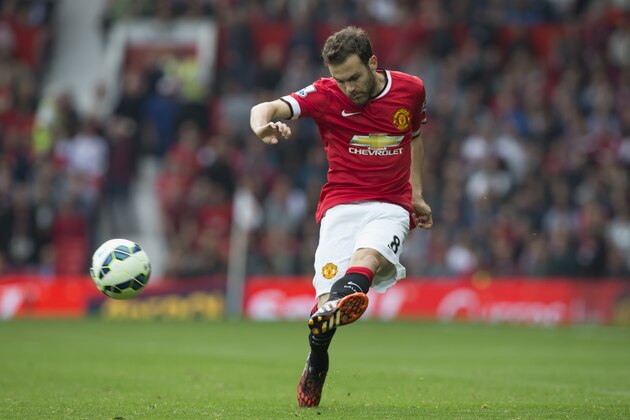 Manchester United's Juan Mata is seen during his team's Queens Park Rangers' during their English Premier League soccer match at Old Trafford Stadium, Manchester, England, Sunday Sept. 14, 2014. (AP Photo/Jon Super)