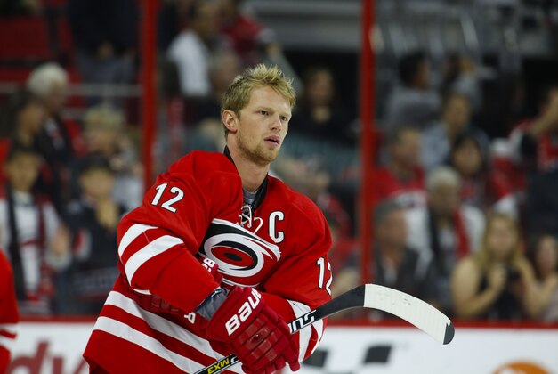 Oct 10, 2014; Raleigh, NC, USA; Carolina Hurricanes forward Eric Staal (12) before the game against the New York Islanders at PNC Arena. The New York Islanders defeated the Carolina Hurricanes 5-3. Mandatory Credit: James Guillory-USA TODAY Sports