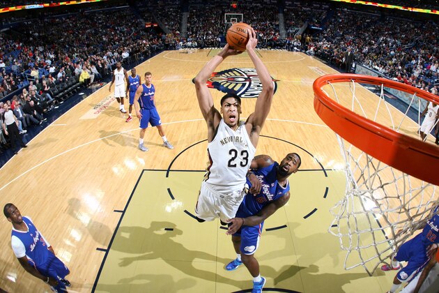 NEW ORLEANS, LA - MARCH 26: Anthony Davis #23 of the New Orleans Pelicans goes up for the dunk against the Los Angeles Clippers during an NBA game on March 26, 2014 at the Smoothie King Center in New Orleans, Louisiana. NOTE TO USER: User expressly acknowledges and agrees that, by downloading and or using this Photograph, user is consenting to the terms and conditions of the Getty Images License Agreement. Mandatory Copyright Notice: Copyright 2014 NBAE (Photo by Layne Murdoch Jr./NBAE via Getty Images)