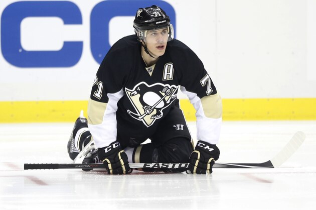Pittsburgh Penguins' Evgeni Malkin (71), of Russia, warms up before the NHL hockey game between the Pittsburgh Penguins and the Anaheim Ducks on Thursday, Oct. 9, 2014 in Pittsburgh. (AP Photo/Keith Srakocic)