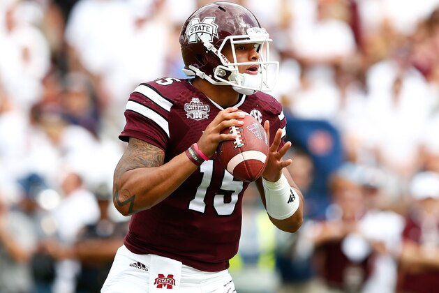 STARKVILLE, MS - OCTOBER 11:  Dak Prescott #15 of the Mississippi State Bulldogs looks to pass against the Auburn Tigers at Davis Wade Stadium on October 11, 2014 in Starkville, Mississippi.  (Photo by Kevin C. Cox/Getty Images)