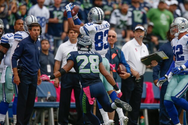 SEATTLE, WA - OCTOBER 12:  Wide receiver Terrance Williams #83 of the Dallas Cowboys makes a catch for a first down in the fourth quarter against the Seattle Seahawks at CenturyLink Field on October 12, 2014 in Seattle, Washington. The Cowboys defeated the Seahawks 30-23.  (Photo by Otto Greule Jr/Getty Images)