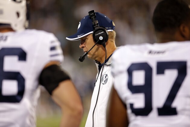 Aug 29, 2014; East Hartford, CT, USA; Brigham Young Cougars head coach Bronco Mendenhall watches from the sideline as they take on the Connecticut Huskies during the second quarter at Rentschler Field. Mandatory Credit: David Butler II-USA TODAY Sports