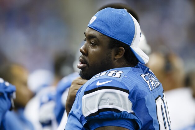 Detroit Lions defensive tackle Nick Fairley (98) on the sideline against the Jacksonville Jaguars during a preseason NFL football game at Ford Field in Detroit, Friday, Aug. 22, 2014. (AP Photo/Rick Osentoski)