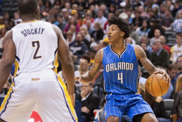 Oct 10, 2014; Indianapolis, IN, USA; Orlando Magic guard Elfrid Payton (4) dribbles the ball in the game against the Indiana Pacers at Bankers Life Fieldhouse. The Orlando Magic beat the Indiana Pacers by the score of  96-93. Mandatory Credit: Trevor Ruszkowski-USA TODAY Sports