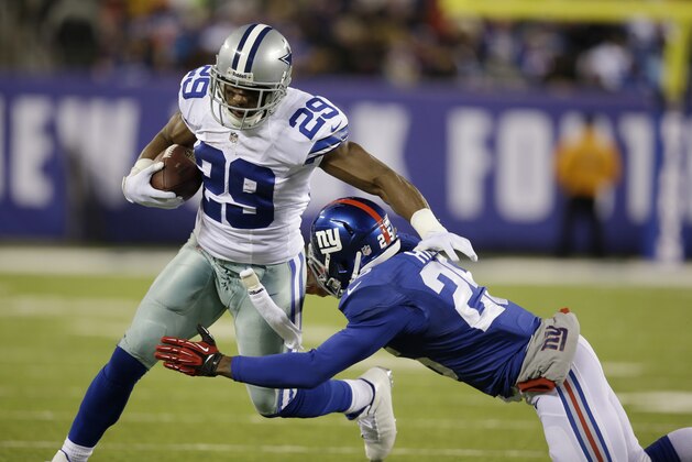 Dallas Cowboys running back DeMarco Murray (29) avoids a tackle by New York Giants free safety Will Hill (25) during the second half of an NFL football game, Sunday, Nov. 24, 2013, in East Rutherford, N.J. (AP Photo/Seth Wenig)