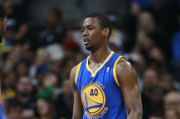 Golden State Warriors forward Harrison Barnes looks on against the Denver Nuggets in the third quarter of the Warriors' 116-112 victory in an NBA basketball game in Denver on Wednesday, April 16, 2014. (AP Photo/David Zalubowski)