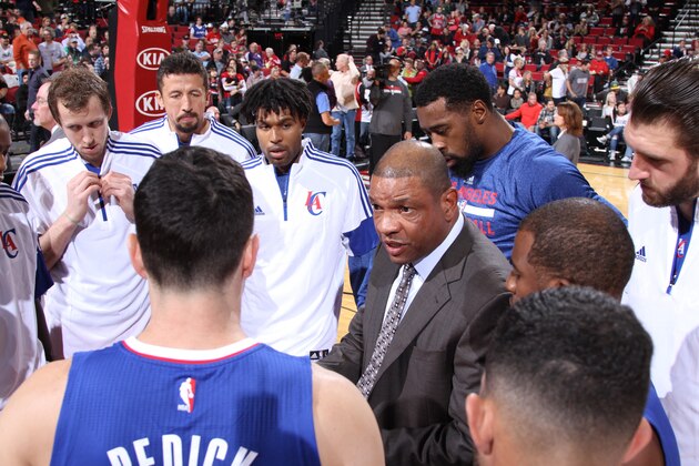 PORTLAND, OR - OCTOBER 12:  Doc Rivers of the Los Angeles Clippers speaks with his team during the game against the Portland Trail Blazers on October 12, 2014 at the Moda Center Arena in Portland, Oregon. NOTE TO USER: User expressly acknowledges and agrees that, by downloading and or using this photograph, user is consenting to the terms and conditions of the Getty Images License Agreement. Mandatory Copyright Notice: Copyright 2014 NBAE (Photo by Sam Forencich/NBAE via Getty Images)