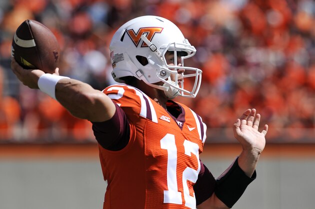 BLACKSBURG, VA - SEPTEMBER 27:  Quarterback Michael Brewer #12 of the Virginia Tech Hokies throws a pass against the Western Michigan Broncos in the first half at Lane Stadium on September 27, 2014 in Blacksburg, Virginia. Virginia Tech defeated Western Michigan 35-17. (Photo by Michael Shroyer/Getty Images)