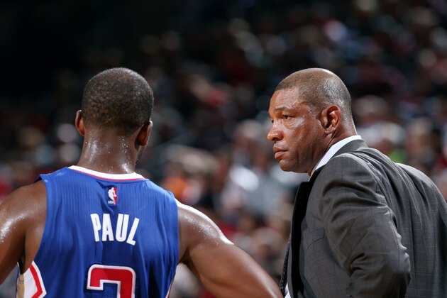 PORTLAND, OR - OCTOBER 12: Head Coach Doc Rivers and Chris Paul #3 of the Los Angeles Clippers speak during a game against the Portland Trail Blazers on October 12, 2014 at the Moda Center Arena in Portland, Oregon. NOTE TO USER: User expressly acknowledges and agrees that, by downloading and or using this photograph, user is consenting to the terms and conditions of the Getty Images License Agreement. Mandatory Copyright Notice: Copyright 2014 NBAE (Photo by Sam Forencich/NBAE via Getty Images)