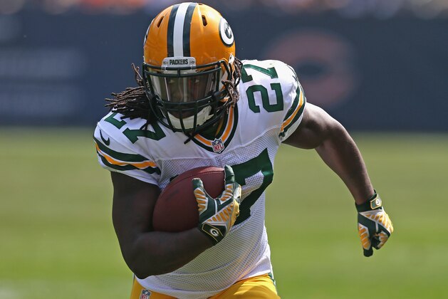 CHICAGO, IL - SEPTEMBER 28:  Eddie Lacy #27 of the Green Bay Packers runs against the Chicago Bears at Soldier Field on September 28, 2014 in Chicago, Illinois. The Packers defeated the Bears 38-17.  (Photo by Jonathan Daniel/Getty Images)