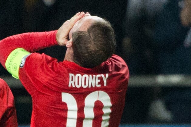 England's Wayne Rooney celebrates after scoring a goal during the Euro 2016 qualifying soccer match between Estonia and England in Tallinn, Estonia, Sunday, Oct. 12, 2014. (AP Photo/Liis Treimann)