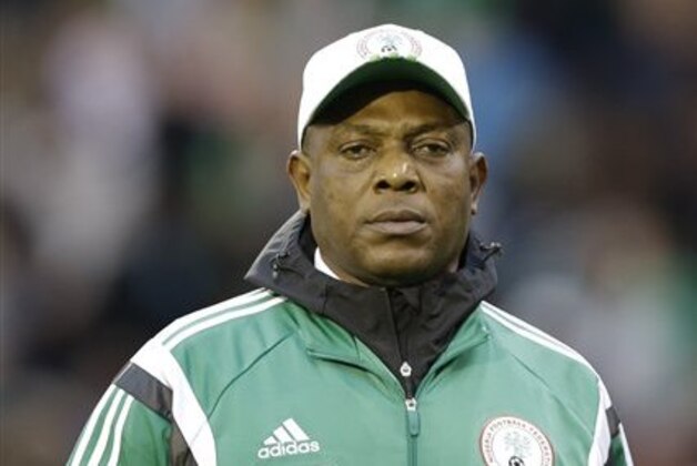 Nigeria's team coach Stephen Keshi  arrives for the international friendly soccer match between Nigeria and Scotland at Craven Cottage Stadium in London, Wednesday, May 28, 2014. Nigeria will be in Group F in the upcoming World Cup in Brazil. (AP Photo/Kirsty Wigglesworth)