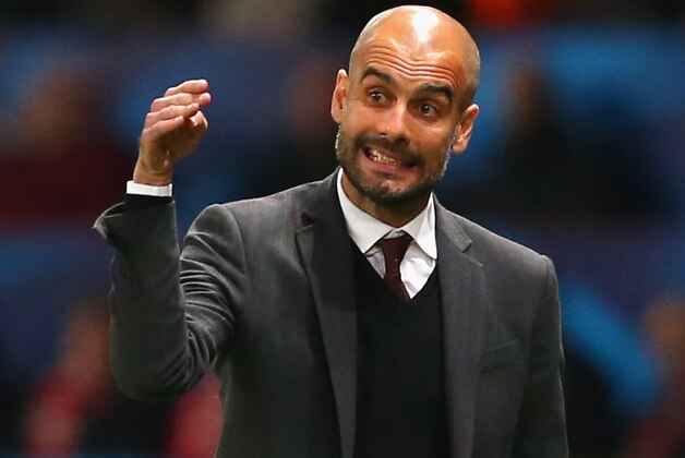 MANCHESTER, ENGLAND - APRIL 01:  Pep Guardiola head coach of Bayern Muenchen gives intructions during the UEFA Champions League Quarter Final first leg match between Manchester United and FC Bayern Muenchen at Old Trafford on April 1, 2014 in Manchester, England.  (Photo by Alex Livesey/Getty Images)