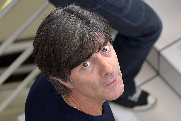 Germany's head coach Joachim Loew arrives for a press conference in Essen, Germany, Monday, Oct. 13, 2014. Germany will play a Euro 2016 group D qualifying soccer match against Ireland on Tuesday in Gelsenkirchen. (AP Photo/Martin Meissner)