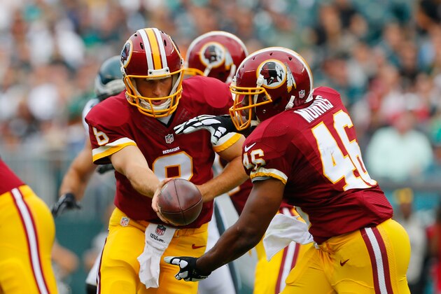 PHILADELPHIA, PA - SEPTEMBER 21:  Kirk Cousins #8 of the Washington Redskins hands off the ball to teammate  Alfred Morris #46 in the first half of the game against the Philadelphia Eagles at Lincoln Financial Field on September 21, 2014 in Philadelphia, Pennsylvania.  (Photo by Rich Schultz/Getty Images)