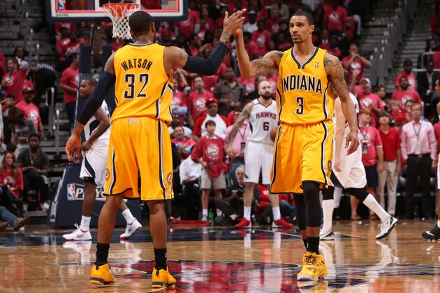 ATLANTA, GA - MAY 1:  George Hill #3 and C.J. Watson #32 of the Indiana Pacers slap hands during a game against the Atlanta Hawks during Game Six of the Eastern Conference Quarterfinals on May 1, 2014 at Philips Arena in Atlanta, Georgia.  NOTE TO USER: User expressly acknowledges and agrees that, by downloading and/or using this Photograph, user is consenting to the terms and conditions of the Getty Images License Agreement. Mandatory Copyright Notice: Copyright 2014 NBAE (Photo by Gary Dineen/NBAE via Getty Images)