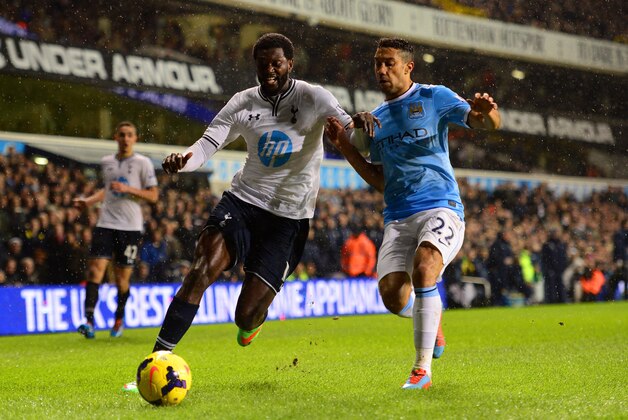 LONDON, ENGLAND - JANUARY 29:  Emmanuel Adebayor of Tottenham Hotspur and Gael Clichy of Manchester City battle for the ball during the Barclays Premier League match between Tottenham Hotspur and Manchester City at White Hart Lane on January 29, 2014 in London, England.  (Photo by Jamie McDonald/Getty Images)