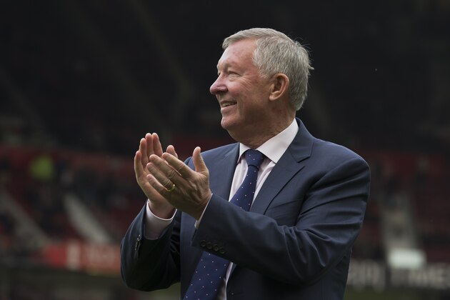Manchester United former manager Alex Ferguson applauds supporters before the team's English Premier League soccer match against  Everton at Old Trafford Stadium, Manchester, England, Sunday Oct. 5, 2014. (AP Photo/Jon Super)