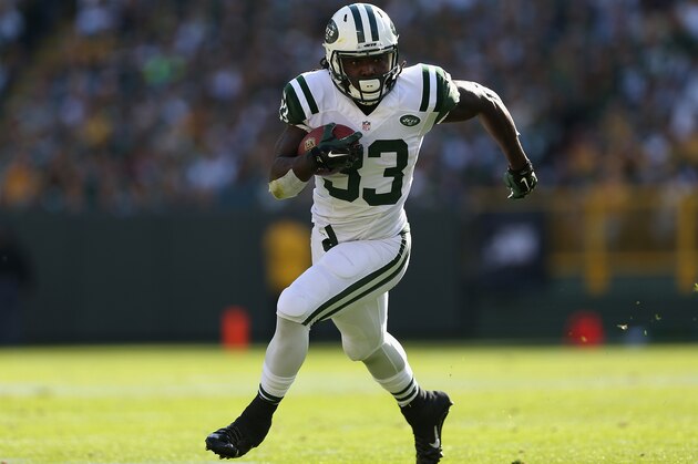 GREEN BAY, WI - SEPTEMBER 14: Running back Chris Ivory #33 of the New York Jets rushes the football against the Green Bay Packers during the NFL game at Lambeau Field on September 14, 2014 in Green Bay, Wisconsin. The Packers defeated the Jets 31-24. (Photo by Christian Petersen/Getty Images) GREEN BAY, WI - SEPTEMBER 14: Running back Chris Ivory #33 of the New York Jets rushes the football against the Green Bay Packers during the NFL game at Lambeau Field on September 14, 2014 in Green Bay, Wisconsin. The Packers defeated the Jets 31-24. (Photo by Christian Petersen/Getty Images)