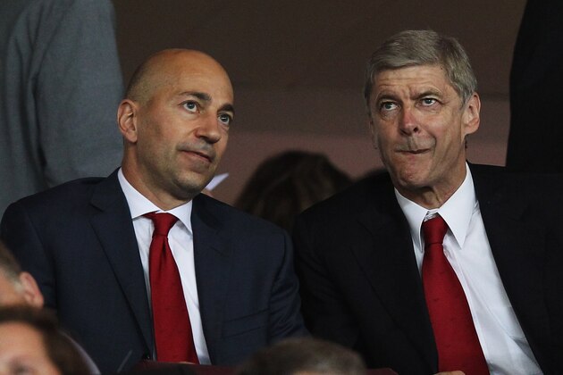LONDON, ENGLAND - SEPTEMBER 28:  Arsene Wenger manager of Arsenal (R) and Ivan Gazidis, CEO of Arsenal (L) look on prior to the UEFA Champions League Group F match between Arsenal and Olympiacos at the Emirates Stadium on September 28, 2011 in London, England.  (Photo by Clive Rose/Getty Images)