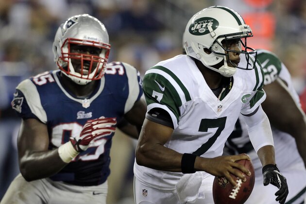 New England Patriots defensive end Chandler Jones (95) chases New York Jets quarterback Geno Smith (7) during the second quarter of an NFL football game Thursday, Sept. 12, 2013, in Foxborough, Mass. (AP Photo/Charles Krupa)