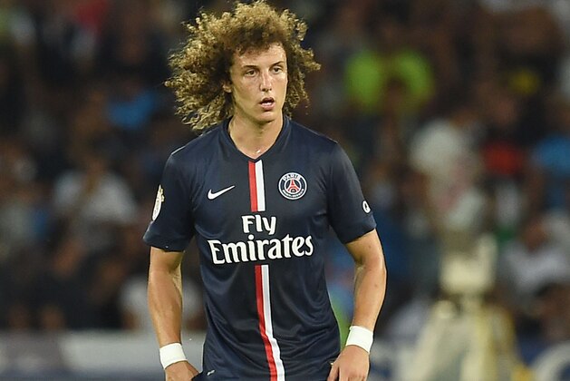 NAPLES, ITALY - AUGUST 11:  David Luiz of Paris Saint Germain  in action during the pre-season friendly match between SSC Napoli and Paris Saint-Germain FC at Stadio San Paolo on August 11, 2014 in Naples, Italy.  (Photo by Giuseppe Bellini/Getty Images)