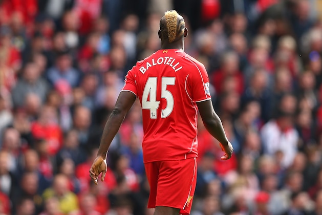LIVERPOOL, ENGLAND - SEPTEMBER 27:  Mario Balotelli of Liverpool looks on during the Barclays Premier League match between Liverpool and Everton at Anfield on September 27, 2014 in Liverpool, England.  (Photo by Alex Livesey/Getty Images)