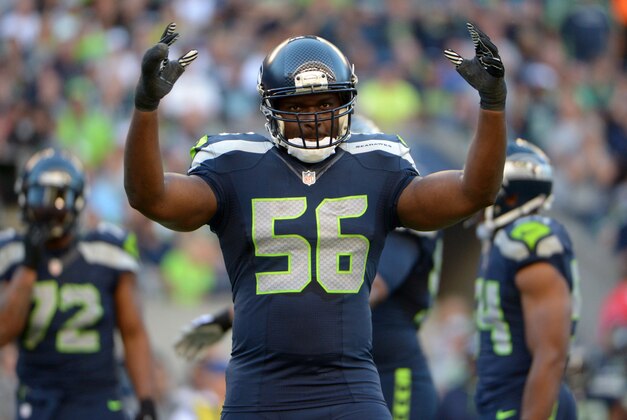 Sep 4, 2014; Seattle, WA, USA; Seattle Seahawks defensive end Cliff Avril (56) reacts during the game against the Green Bay Packers at CenturyLink Field. The Seahawks defeated the Packers 36-16. Mandatory Credit: Kirby Lee-USA TODAY Sports