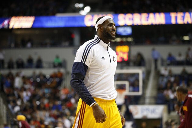 CINNCINNATI, OH - OCTOBER 15:  LeBron James #23 of the Cleveland Cavaliers smiles during the game against the Indiana Pacers at the Cintas Center at Xavier University on October 15, 2014 in Cincinnati, Ohio. NOTE TO USER: User expressly acknowledges and agrees that, by downloading and/or using this Photograph, user is consenting to the terms and conditions of the Getty Images License Agreement. Mandatory Copyright Notice: Copyright 2014 NBAE (Photo by Gregory Shamus/NBAE via Getty Images)