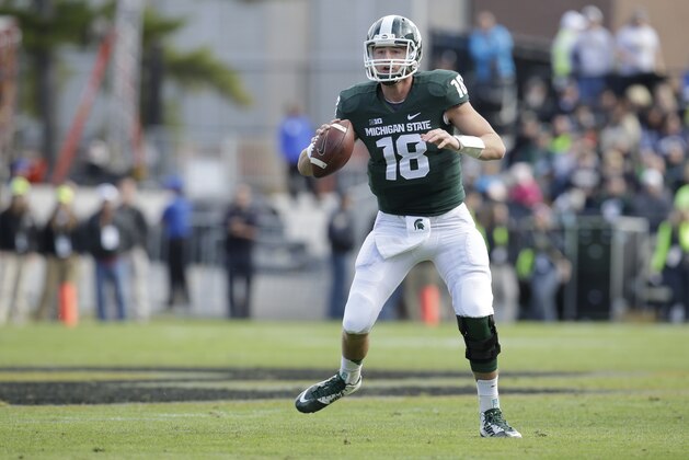 Michigan State quarterback Connor Cook (18) as Michigan State played Purdue in an NCAA college football game in West Lafayette, Ind., Saturday, Oct. 11, 2014. Michigan State won 45-31. (AP Photo/AJ Mast)