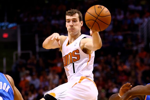 Apr 6, 2014; Phoenix, AZ, USA; Phoenix Suns guard Goran Dragic (1) passes the ball in the second half against the Oklahoma City Thunder at US Airways Center. The Suns defeated the Thunder 122-115. Mandatory Credit: Mark J. Rebilas-USA TODAY Sports