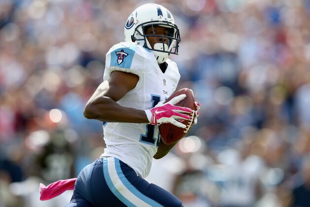 NASHVILLE, TN - OCTOBER 05:  Justin Hunter #15 of the Tennessee Titans runs for a touchdown during the game against the Cleveland Browns at LP Field on October 5, 2014 in Nashville, Tennessee.  (Photo by Andy Lyons/Getty Images)